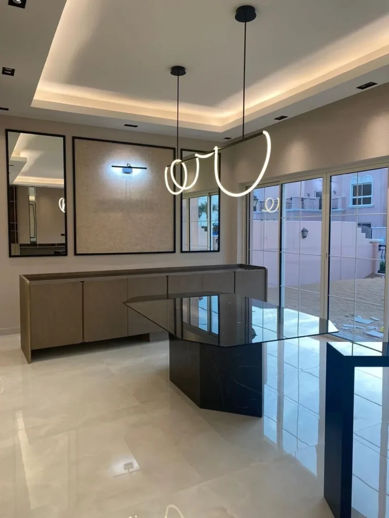 About Company - Cheerful Woman Holding Clipboard And Shaking Hands With Handyman - Dreams Care Technical Services LLC