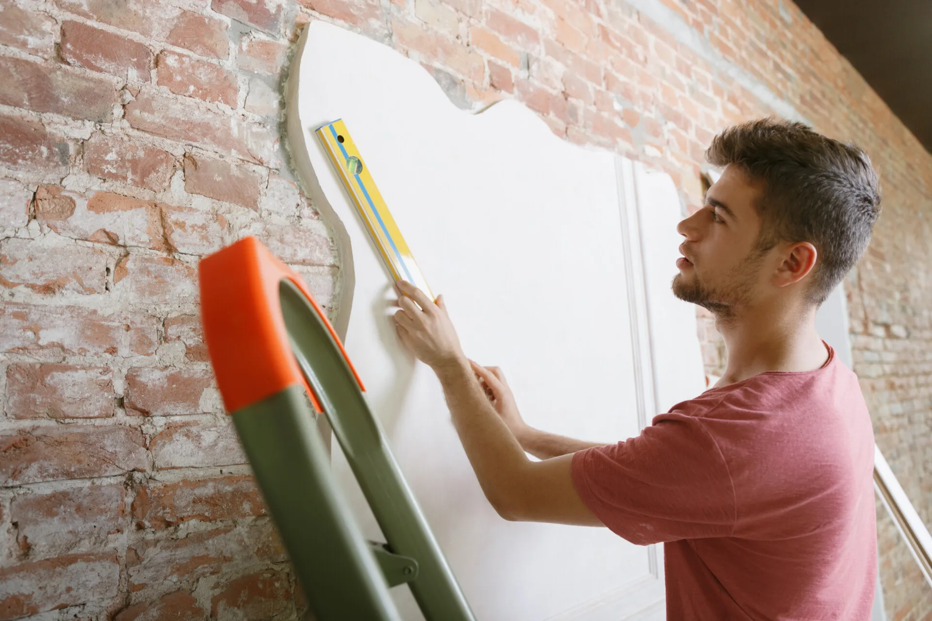 handyman-replacing-lightbulb-at-home-1.jpg